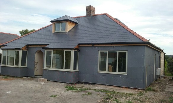Insulation added to the outside walls, waiting for final weather render to go back on over the top. The house is temporarily invisible to radar!